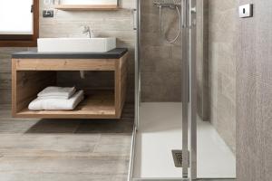 a bathroom with a sink and a shower at Appartamenti Roby - Appartamenti Abar in Livigno +36 photos