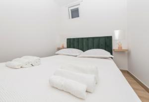 Posteľ alebo postele v izbe v ubytovaní Apartment Maro - Baška Voda