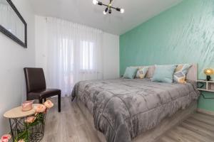 Postel nebo postele na pokoji v ubytování Apartman Gržetić