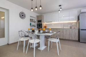 Kuchyň nebo kuchyňský kout v ubytování Apartman Gržetić