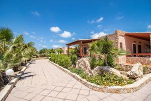 Κήπος έξω από το Residence Villalba