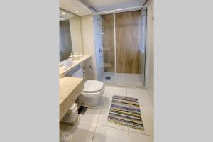 a bathroom with a toilet and a shower at N1A1 - New, Nice, for Long and Short Stay in Asuncion +7 photos