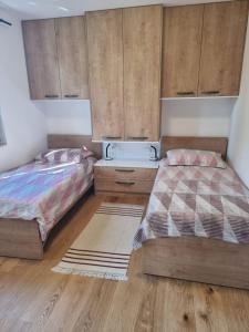 Posteľ alebo postele v izbe v ubytovaní Apartments Amfa