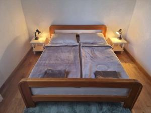 Posteľ alebo postele v izbe v ubytovaní Apartments Amfa