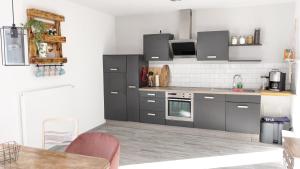 Kuchyň nebo kuchyňský kout v ubytování Ferienwohnung Kern Hitzacker