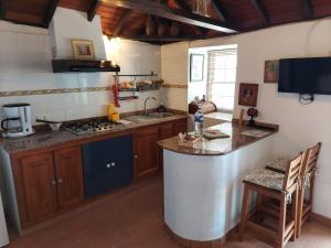 Kuchyň nebo kuchyňský kout v ubytování VV Casa Bastina "by henrypole home"
