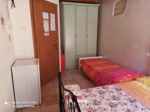 Posteľ alebo postele v izbe v ubytovaní Bed & Breakfast Onda Blu