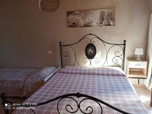 Posteľ alebo postele v izbe v ubytovaní Bed & Breakfast Onda Blu