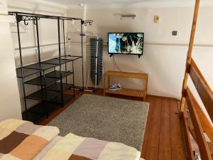 A bed or beds in a room at Halkoz Apartment