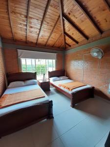 Ένα ή περισσότερα κρεβάτια σε δωμάτιο στο Finca la bilbaina # 4