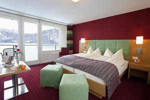 Ένα ή περισσότερα κρεβάτια σε δωμάτιο στο Hotel Alexander