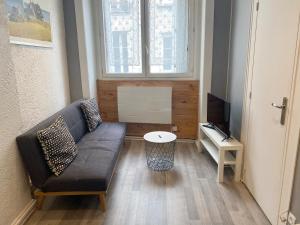Χώρος καθιστικού στο 010 CHIC & COSY F1 29m2 HYPERCENTRE WIFI SMART TV NETFLIX