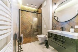 Kúpeľňa v ubytovaní Pomorskie Apartamenty Bernadowska Silver