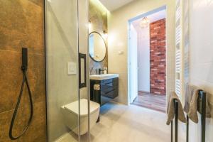 Kúpeľňa v ubytovaní Pomorskie Apartamenty Bernadowska Silver