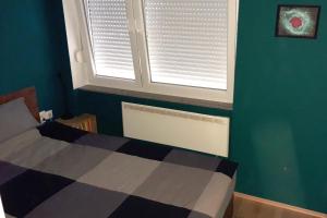 Postel nebo postele na pokoji v ubytování Apartman TIN
