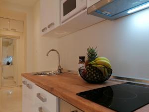 Kuchyň nebo kuchyňský kout v ubytování Sea Pleasure Apartment