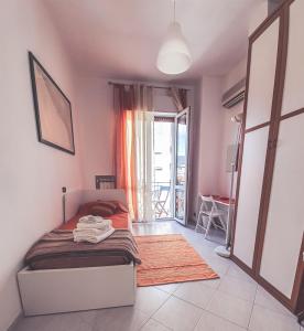 A bed or beds in a room at La Borgata