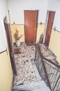 A bed or beds in a room at La Borgata
