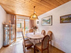 a dining room with a table and chairs at Quaint Holiday Home in Bad K tzting with Garden Terrace in Bad Koetzting