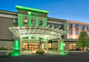 a rendering of a hotel with a building at Holiday Inn & Suites Salt Lake City - Airport West by IHG in Salt Lake City