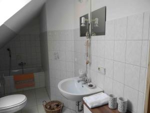 Ванная комната в Ferienwohnungen am Unstrutwehr