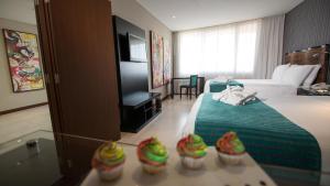 TV a/nebo společenská místnost v ubytování Hotel Camino Real