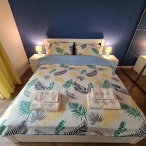 Posteľ alebo postele v izbe v ubytovaní Apartament Słoneczne Nabrzeże