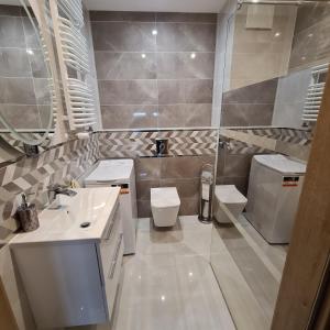 Kúpeľňa v ubytovaní Apartament Słoneczne Nabrzeże