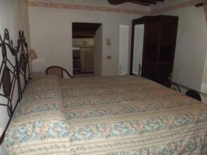 A bed or beds in a room at Agriturismo Villa Gabbiano