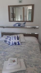A bed or beds in a room at Fabienne
