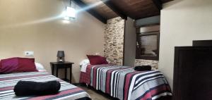 Posteľ alebo postele v izbe v ubytovaní Casa Das Airas