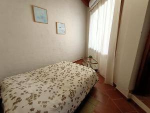 A bed or beds in a room at Apartamento Aymara de StarApsTenerife
