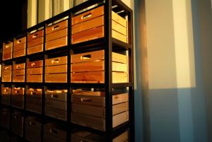 a wooden chest of drawers in a room at 台灣潛水綠島店 Green Island Dive in Green Island