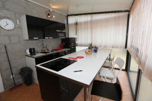 Η κουζίνα ή μικρή κουζίνα στο Appartement au calme à 15 minutes de Sartène +8 φωτογραφίες