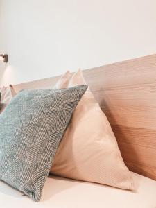 Postel nebo postele na pokoji v ubytování Hotel Bayrischer Hof