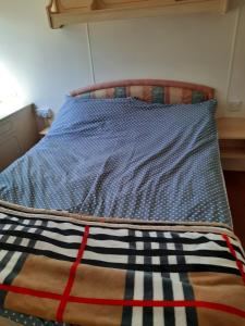 Posteľ alebo postele v izbe v ubytovaní Domek Holenderski Stary Dwór