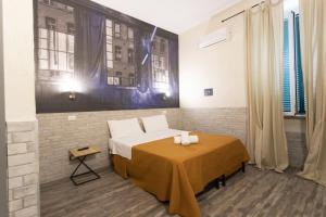 Postel nebo postele na pokoji v ubytování Hotel Agorà