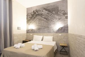Postel nebo postele na pokoji v ubytování Hotel Agorà