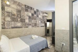 Postel nebo postele na pokoji v ubytování Hotel Agorà