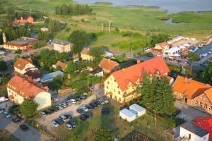 an aerial view of a small town with cars parked at Pokoje U Emilii in Kąty Rybackie
