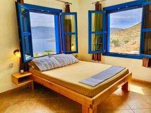 Katil atau katil-katil dalam bilik di Villa Orea Thea, Emborios, Kalymnos