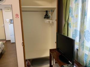 TV a/nebo společenská místnost v ubytování Asahi21 Asahibashi-Ekimae