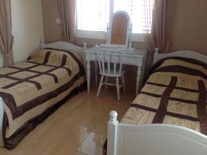 Postel nebo postele na pokoji v ubytování Villa Garmar CTO Approved 4487