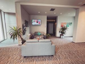 TV a/nebo společenská místnost v ubytování Hotel Enjoy