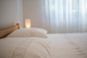 Posteľ alebo postele v izbe v ubytovaní Apartments Ana S