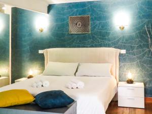 Ένα ή περισσότερα κρεβάτια σε δωμάτιο στο Casa del Moro - romantic loft in Trastevere