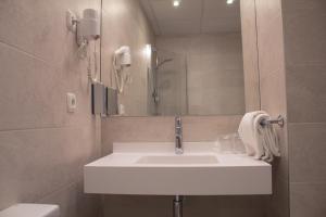 Koupelna v ubytování Hotel Ezeiza