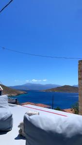 a view of the ocean from the roof of a house at Villetta Erato,picturesque studio in Chalki in Halki