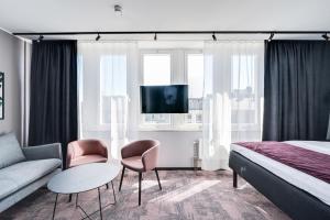 TV a/nebo společenská místnost v ubytování Hotel Fridhem