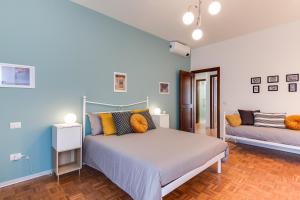 Cama o camas de una habitación en RomagnaBNB Vittoria
